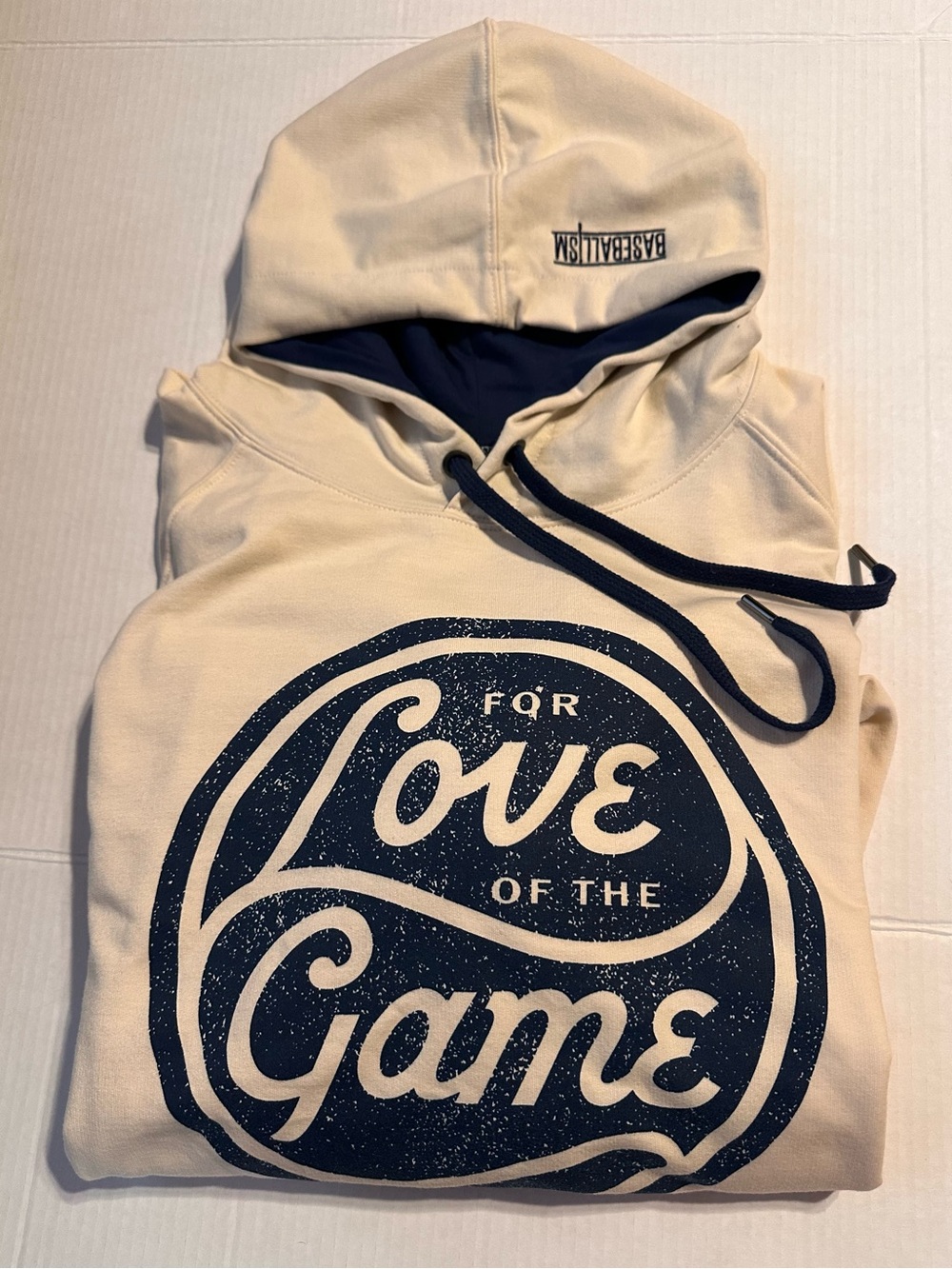 'For Love of the Game' Cream Hoodie with Navy Print by Baseballism